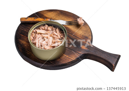 Freshly opened tinned tuna, showcasing its rich texture and flavor, a must-have for any pantry. isolated on white background. top view Freshly opened tinned tuna, showcasing its rich texture and flavor, a must-have for any pantry. isolated on white background. top view 137445913