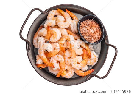 A tray of shrimp is served with a black bowl of salt. isolated on white background A tray of shrimp is served with a black bowl of salt. isolated on white background 137445926