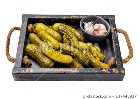 Sweet and tangy pickled cucumbers, ideal for enhancing burgers and wraps with a burst of flavor. isolated on white background. top view 137445937