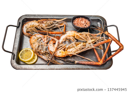 Deliciously grilled giant river prawns on steel tray, ideal for summer gatherings and outdoor feasts. isolated on white background. top view Deliciously grilled giant river prawns on steel tray, ideal for summer gatherings and outdoor feasts. isolated on white background. top view 137445945