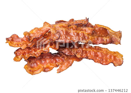 Streaky crispy bacon cooked to sizzling caramelized texture with pork notes and rich smoky taste great for breakfast and snack themes. 137446212