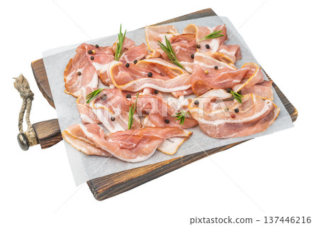 Raw streaky bacon pork slices on parchment with rosemary and peppercorns perfect for cooking themes recipes Raw streaky bacon pork slices on parchment with rosemary and peppercorns perfect for cooking themes recipes 137446216