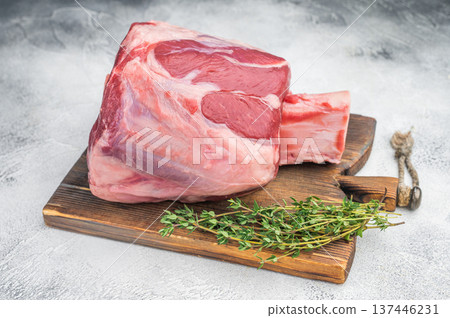 Fresh raw beef shank knuckle whole cut with bone styled with thyme and salt copy space on stone background ingredient for ossobuco Fresh raw beef shank knuckle whole cut with bone styled with thyme and salt copy space on stone background ingredient for ossobuco 137446231
