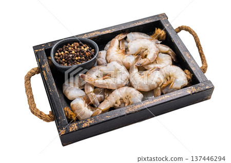 Raw white shrimps, headless fresh prawns in a tray isolated on white background. Raw white shrimps, headless fresh prawns in a tray isolated on white background. 137446294