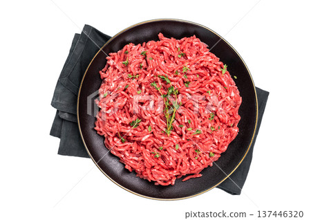 Lamb Mutton ground mince raw meat, forcemeat on a black plate, isolated on white background. 137446320