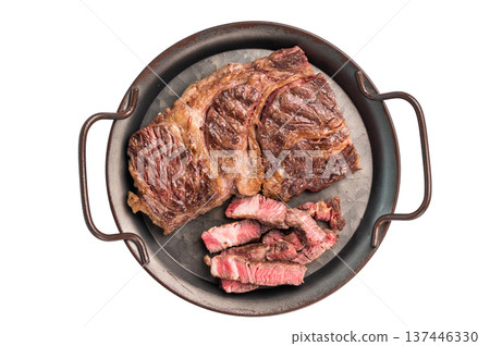 BBQ Grilled and sliced Chuck eye roll steak, marbled beef meat in a steel tray isolated on white background BBQ Grilled and sliced Chuck eye roll steak, marbled beef meat in a steel tray isolated on white background 137446330