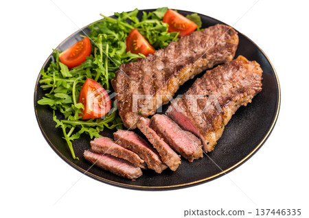 Grilled Steak from Black Angus beef meat on a plate with salad isolated on white background Grilled Steak from Black Angus beef meat on a plate with salad isolated on white background 137446335