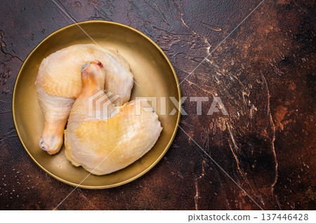 Chicken legs, raw poultry meat on black background, top view Chicken legs, raw poultry meat on black background, top view 137446428