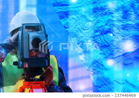 Surveyor peers through precision instrument 137446469