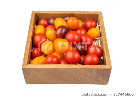 Mixed heirloom cherry tomatoes in a rustic wooden box overhead shot perfect for farm fresh produce healthy cooking and market visuals.. Mixed heirloom cherry tomatoes in a rustic wooden box overhead shot perfect for farm fresh produce healthy cooking and market visuals.. 137446606