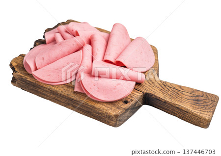 Raw, processed luncheon meat (salami/ham) slices piled high on a rustic wood board, perfect for sandwiches or a quick snack. 137446703
