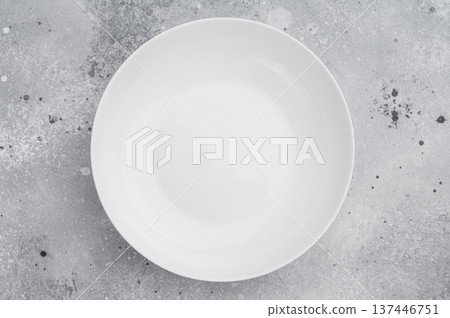 Minimal white plate on gray textured background. Elegant ceramic tableware mockup for food design and presentation 137446751
