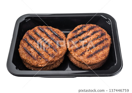 Grilled plant based burger patties vegan meat alternative packaged in black tray isolated on white background top view Grilled plant based burger patties vegan meat alternative packaged in black tray isolated on white background top view 137446759