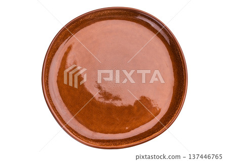 Empty brown ceramic plate top view isolated on background. Glossy round tableware with copy space 137446765