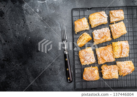 Milk pie custard pastry made of crispy filo layers sliced and served as bakery dessert with copy space Milk pie custard pastry made of crispy filo layers sliced and served as bakery dessert with copy space 137446804