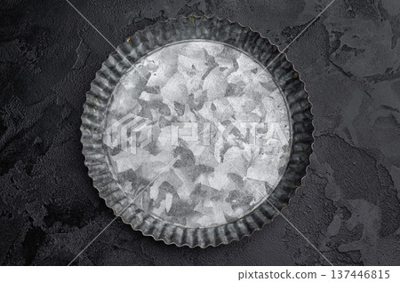 Aged round metal plate top view. Rustic galvanized platter with textured surface isolated on background 137446815