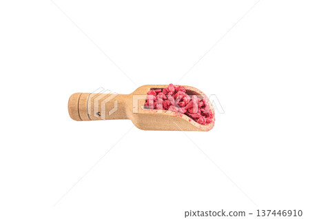 Freeze dried raspberry chunks used as natural topping and baking inclusion. Minimal food texture on white background Freeze dried raspberry chunks used as natural topping and baking inclusion. Minimal food texture on white background 137446910
