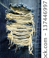 Damaged part of jeans 137446997