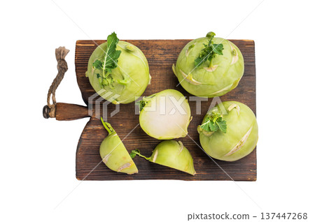 Cabbage kohlrabi on wooden board, raw Organic Vegetable isolated on white backround. top view Cabbage kohlrabi on wooden board, raw Organic Vegetable isolated on white backround. top view 137447268
