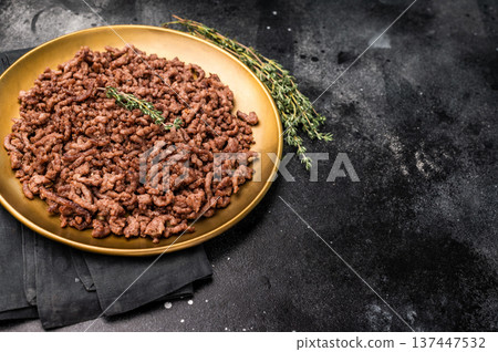 Roast and Fried mince meat, fresh cooked ground meat in a plate. black background. top view 137447532