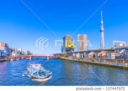 Tokyo cityscape in Japan, with views of Azumabashi Bridge, the water bus "Emeraldas," Tokyo Skytree, and more (March 8th) 137447972