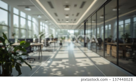 Abstract office interior background. Blurry office space. Modern workspace design with plants, blurred furniture and glass walls. Natural light, commercial building, business concept. Abstract office interior background. Blurry office space. Modern workspace design with plants, blurred furniture and glass walls. Natural light, commercial building, business concept. 137448028