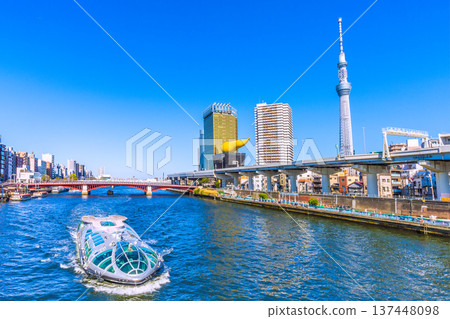 Tokyo cityscape in Japan, with views of Azumabashi Bridge, the water bus "Emeraldas," Tokyo Skytree, and more (March 8th) 137448098