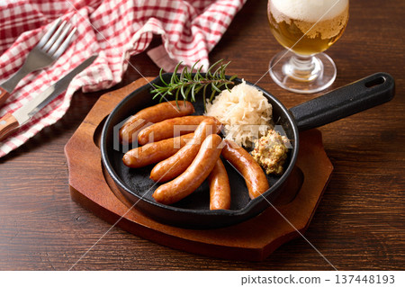 Sausages served in a skillet 137448193