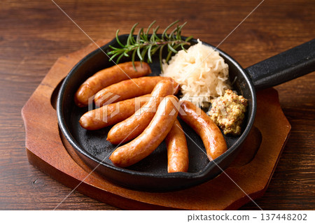 Sausages served in a skillet Sausages served in a skillet 137448202