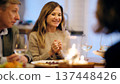 Senior woman smiling enjoying dinner party with friends 137448426