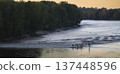 Surfers enjoy the tidal bore at Vague du Mascaret in Podensac, Gironde 137448596