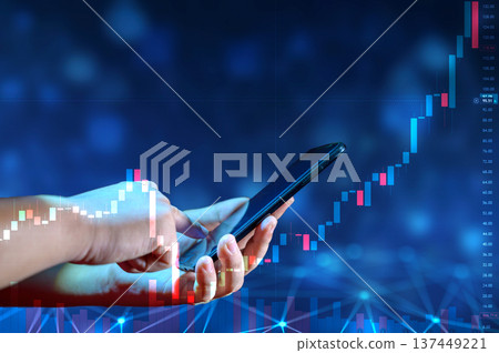 Business man trader investor analyst using mobile phone app analytics for cryptocurrency financial market analysis, trading data index chart graph on smartphone. 137449221