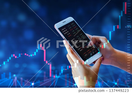 Business man trader investor analyst using mobile phone app analytics for cryptocurrency financial market analysis, trading data index chart graph on smartphone. 137449223