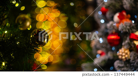 Blurred holiday background with bokeh. Defocused New Year and Christmas illumination 137449444