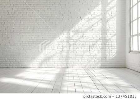 Inviting Room with White Brick Wall and Natural Light Streaming Through a Spacious Window Inviting Room with White Brick Wall and Natural Light Streaming Through a Spacious Window 137451815