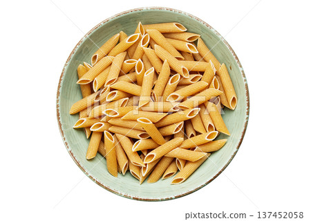 Whole Grain penne pasta from durum wheat in bowl isolated on white background. 137452058