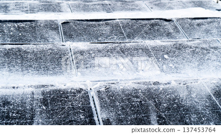 Solar panels in snow 137453764