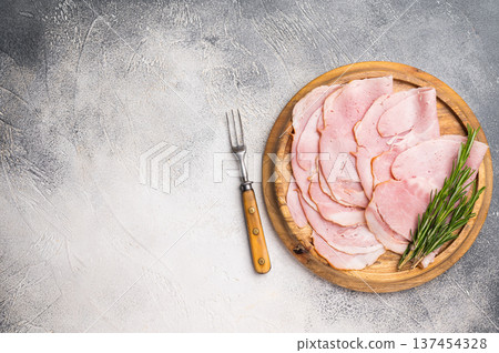 Prosciutto Cotto, Sliced Pork Ham on wooden board. white background. top view 137454328