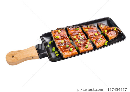 Japanese grilled eel with sweet soy sauce isolated on white background. top view Japanese grilled eel with sweet soy sauce isolated on white background. top view 137454357