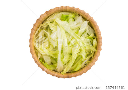 Fresh raw iceberg lettuce salad cut leaves in wooden bowl isolated on white background. top view Fresh raw iceberg lettuce salad cut leaves in wooden bowl isolated on white background. top view 137454361