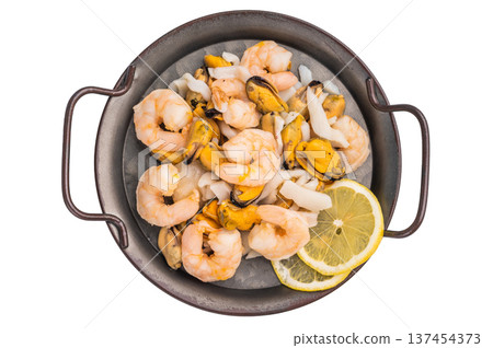 Fresh Seafood Mix with Mussels, Clams, Prawns, Shrimps and squid isolated on white background. top view 137454373