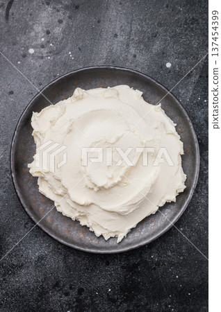 Creamy Homemade Mascarpone cheese, cream cheese. black background. top view 137454399