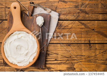 Italian Mascarpone cheese, cream cheese for tiramisu. wooden background. top view 137454445