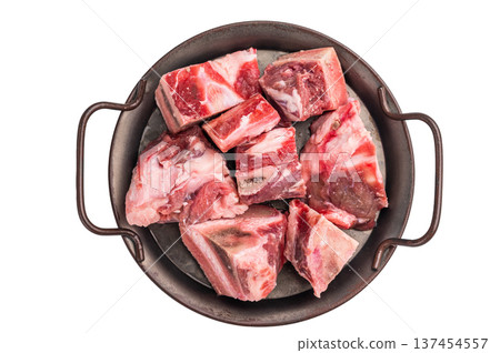 Raw Beef meat and veal bones for stew or goulash isolated on white background. top view. Raw Beef meat and veal bones for stew or goulash isolated on white background. top view. 137454557