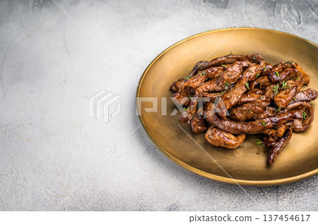 Asian food Teriyaki beef meat on a plate on grey background. top view Asian food Teriyaki beef meat on a plate on grey background. top view 137454617