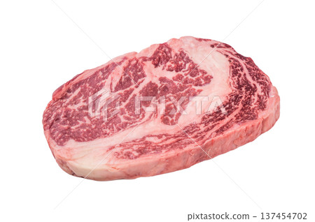 Fresh raw rib eye beef steak entrecote style with rich marbling. Premium rib fillet meat cut isolated on white background. 137454702