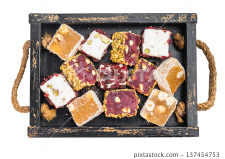 Premium assorted lokum sweets in vintage tray. Soft chewy jelly candy with nuts and festive style. Premium assorted lokum sweets in vintage tray. Soft chewy jelly candy with nuts and festive style. 137454753