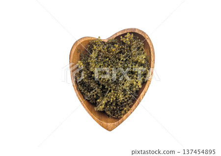 Bowl of sea grapes also known as green caviar and sea caviar served with soy sauce on isolated background Asian umibudo seaweed 137454895