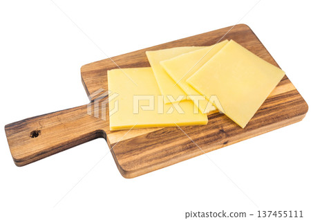 Neatly stacked yellow cheese slices on white background, Edam Gouda Havarti type semi hard dairy food ingredient 137455111
