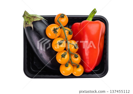 Red bell pepper eggplant and vine cherry tomatoes in plastic tray, overhead food composition 137455112